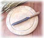 Lovely antique bread board and knike.