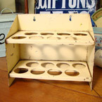 A cream painted Tala tin egg rack.