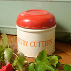 A Tala red pastry cutters tin.
