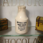 French ceramic mustard bottle.