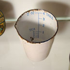 Rare tiny enamel measuring jug.