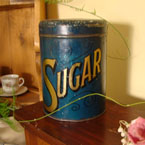 Antique blue sugar tin gold writting.