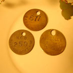 Three antique miners brass pit tokens.