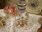Antique hand painted glass bottle roses.
