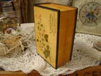 An Antique Mauchlineware wooden sewing box.