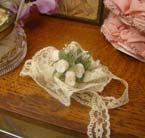 Beautiful old posy of fabric roses.