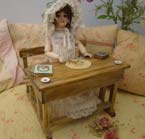 Antique doll's school desk.