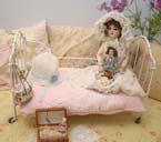 Antique French metal doll cot.