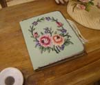 Petit point note book.