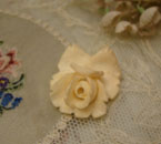 Antique ivory carved rose pendant.
