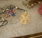 Wonderful carved ivory pendant.